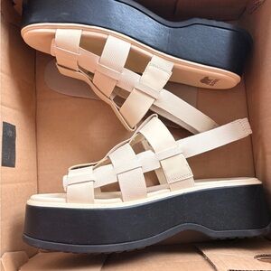 Sorel Cream and Black Platform Sandals
